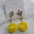 Earring with pompom yellow
